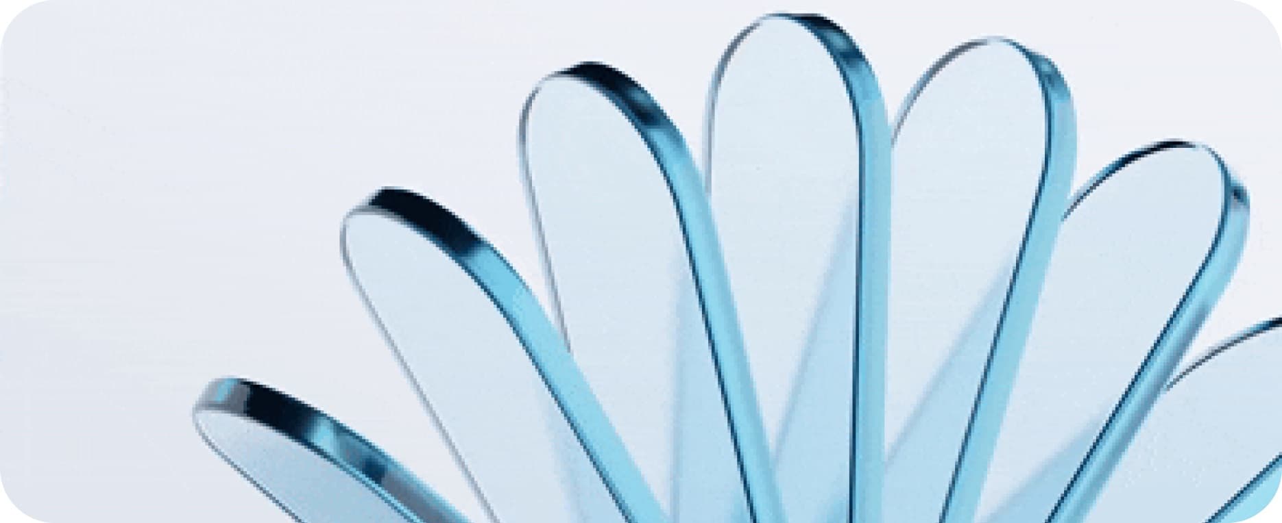 Fanned translucent glass petals catching blue light